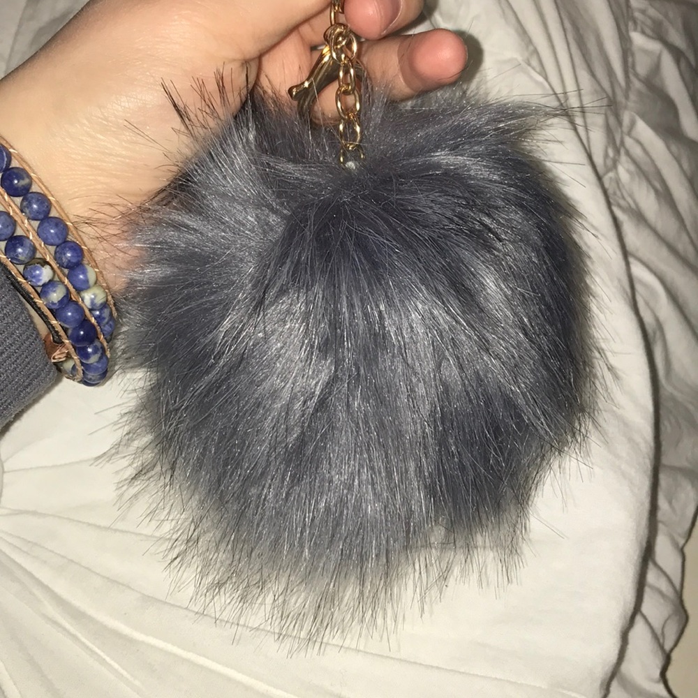 grey pom pom ball
